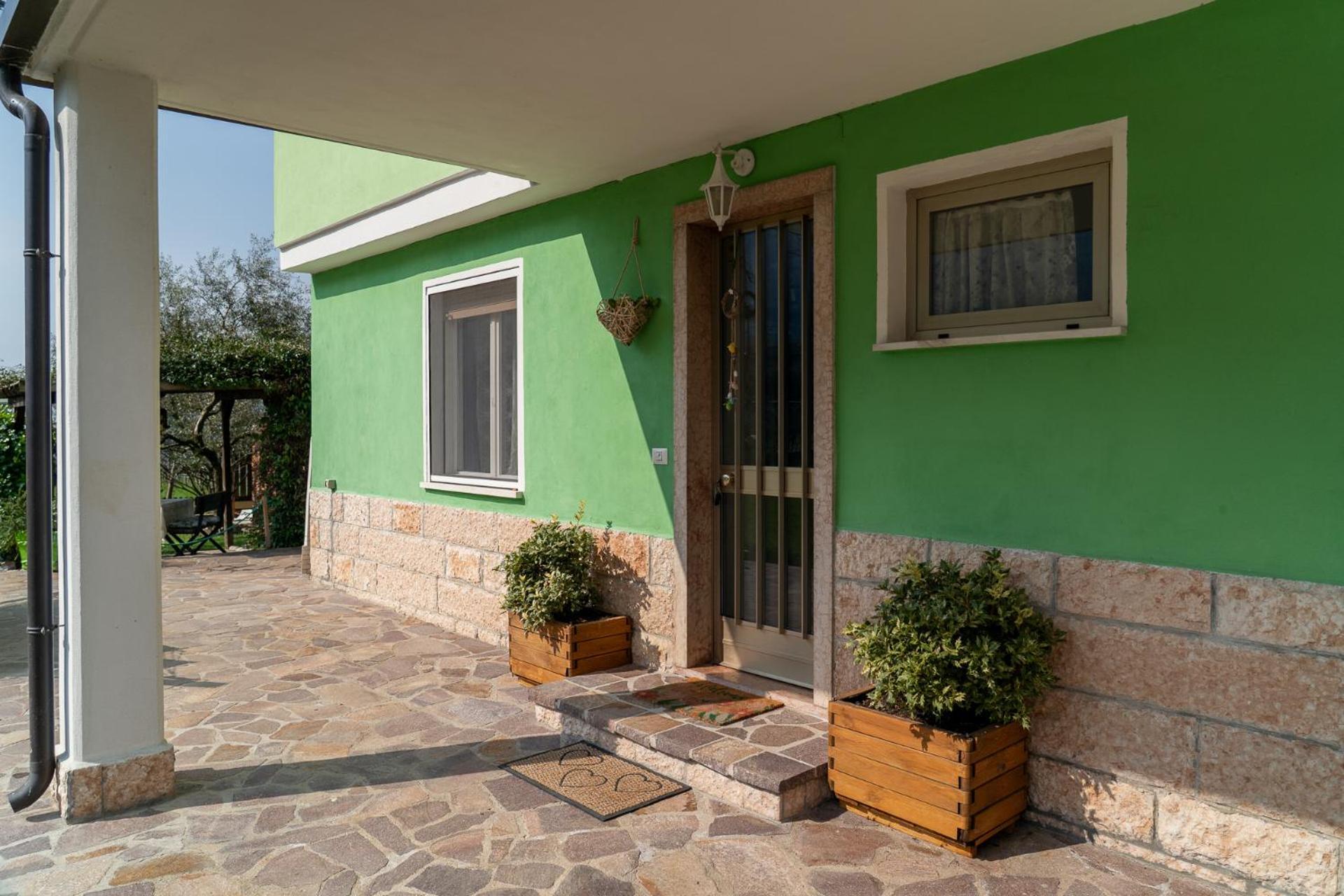La Casa Nel Verde Arco Bagian luar foto